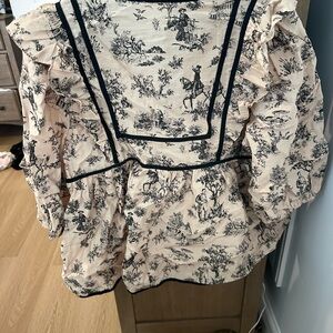 Umgee Cream and Black Ruffled Blouse